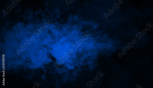 Abstract blue smoke mist fog on a black background. Texture background for graphic and web.