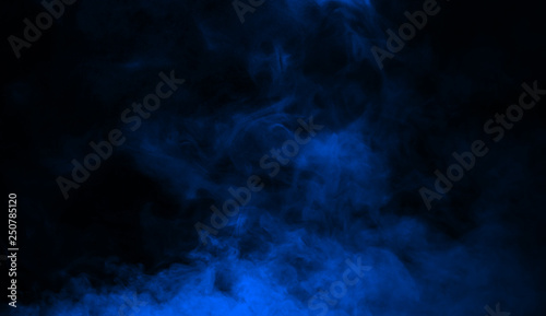 Abstract blue smoke mist fog on a black background. Texture background for graphic and web.