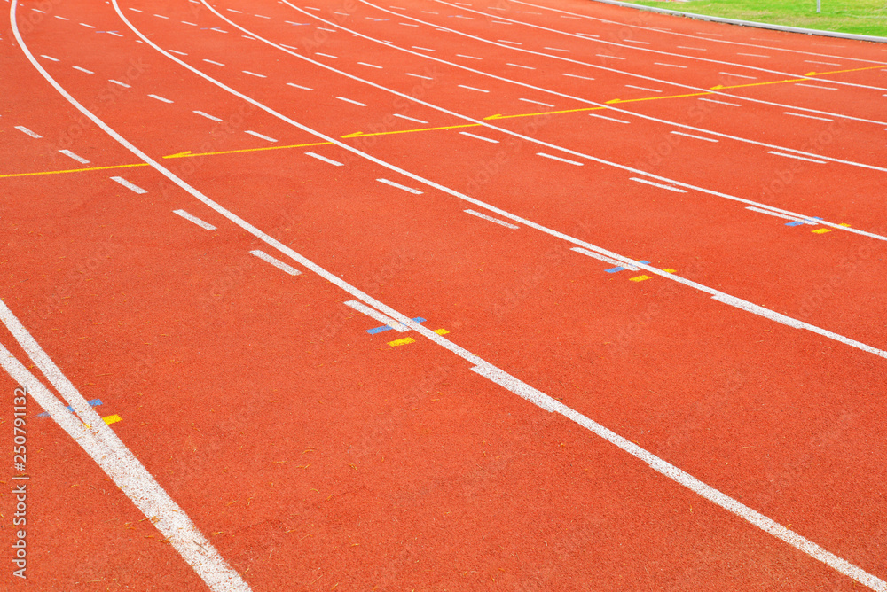 Athletics Track Run / Red running track in stadium with green field