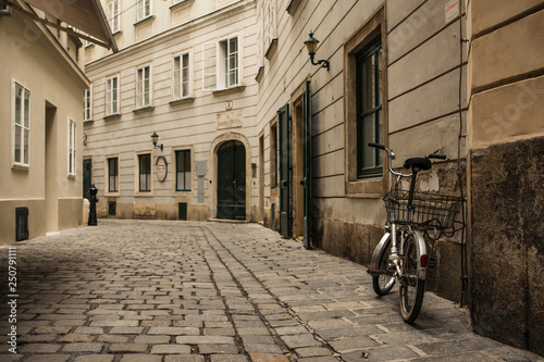Fototapeta Naklejka Na Ścianę i Meble -  Bicycle on the small street in Wien, Austria