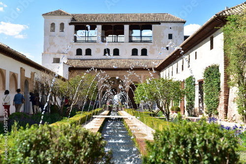 Alhambra palace,  water fountain Patio de la Azequia in  Generalife Garden, Granada, Spain 