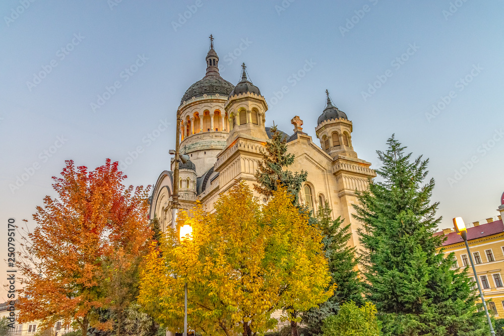 The Dormition of the Theotokos Cathedral at sunset, the most famous Romanian Orthodox church of Cluj-Napoca, Romania. Built in a Romanian Brancovenesc style