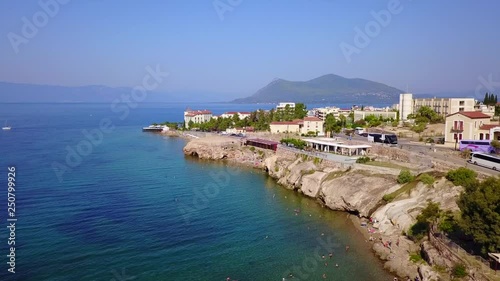 Aerial birds eye view video taken by drone of picturesque village of Aidipsos known for hot springs, North Evoia, Greece photo