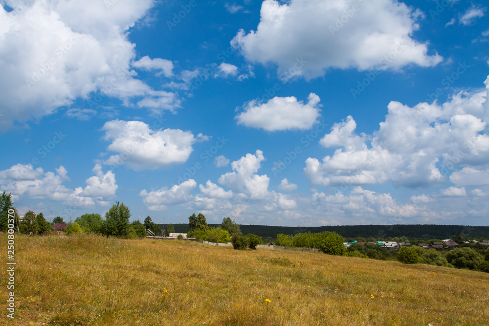 Rustic landscape with blue sky and clouds. Rustic landscape with blue sky and clouds.