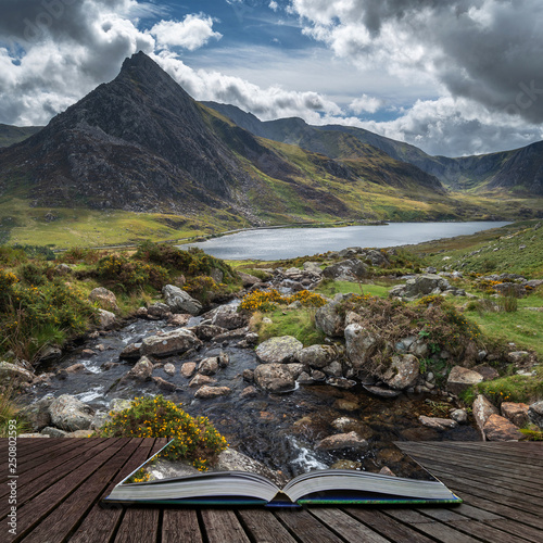 Stunning landscape image of countryside around Llyn Ogwen in Snowdonia during early Autumn coming out of pages of open story book photo