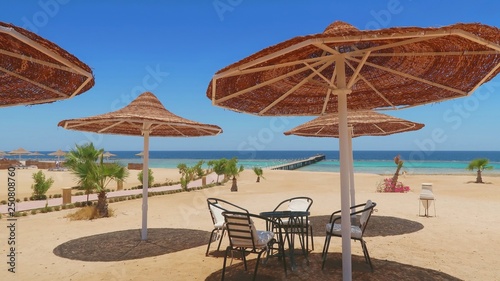 Fototapeta Naklejka Na Ścianę i Meble -  Idylic hotel beach with sun umbrelas, Red Sea, Egypt