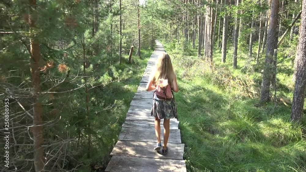 Child Walking in Forest, Kid Outdoor Nature, Girl Playing in Camping Adventure Child Walking in Forest, Kid Outdoor Nature, Girl Playing in Camping Adventure