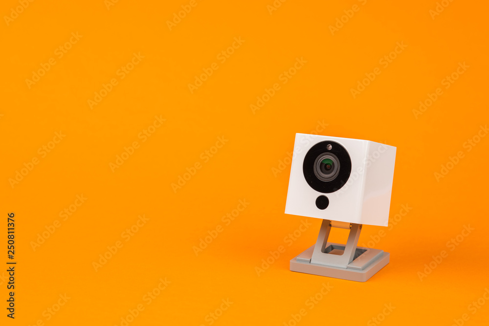 white webcam on orange background, object, Internet, technology concept