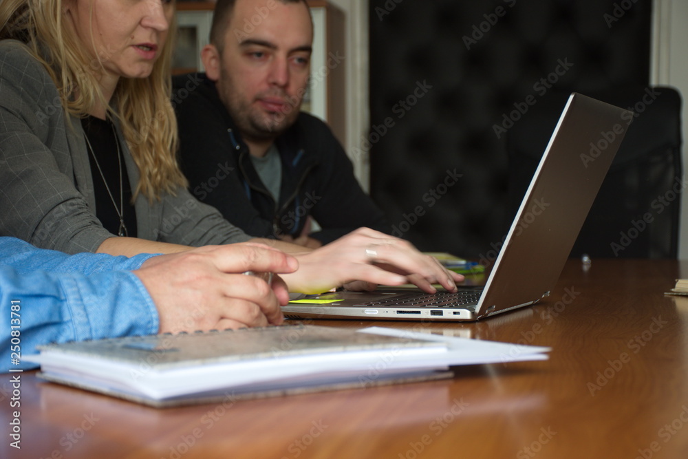 Fototapeta premium People in the office using laptop