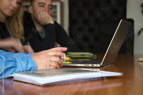 People in the office using laptop