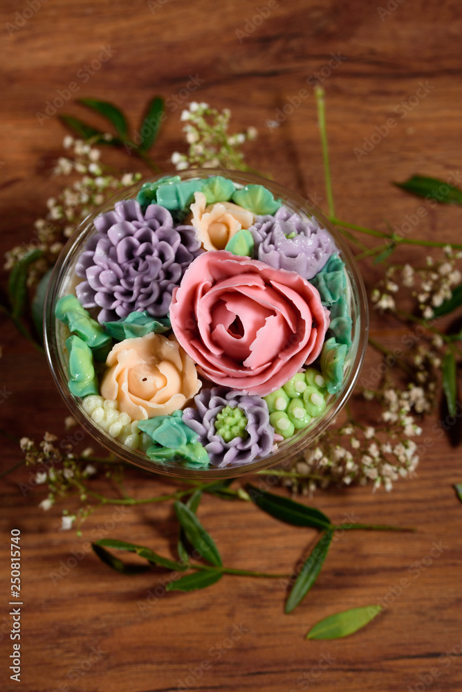 Delicious, appetizing, fragrant dessert. Triple delicious light dessert, decorated with oil flowers. Delicious, appetizing, fragrant dessert. Triple delicious light dessert, decorated with oil flowers.