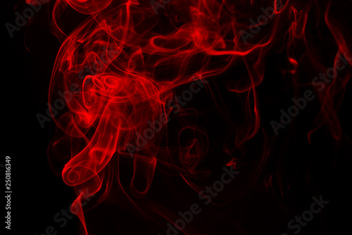 Red smoke abstract on black background. fire design, darkness concept