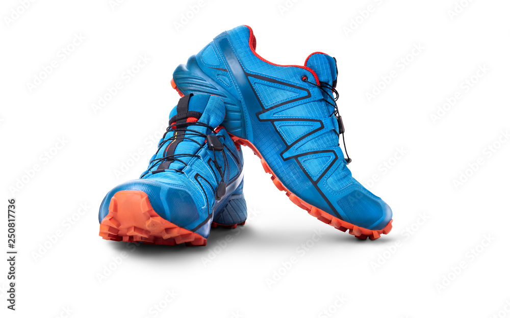 Front view of blue and Orange trainers isolated on a white background.