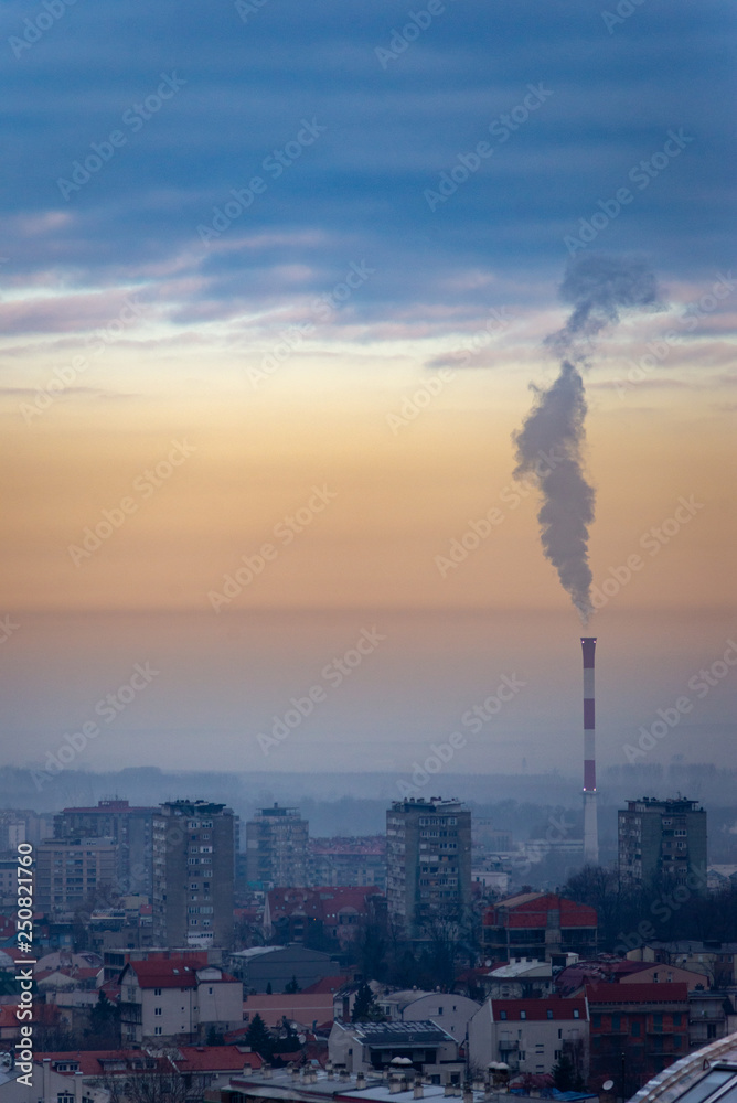 Obraz premium Cityscape and view to the city central heating plant in the winter season