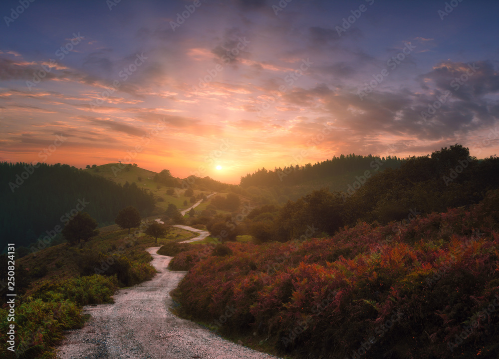 path in the mountains with beautiful sunset