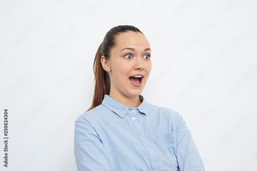 young girl looking surprised to the right young girl looking surprised to the right