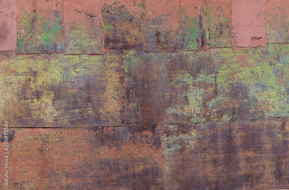 Obraz premium Wall of rusty iron sheets.