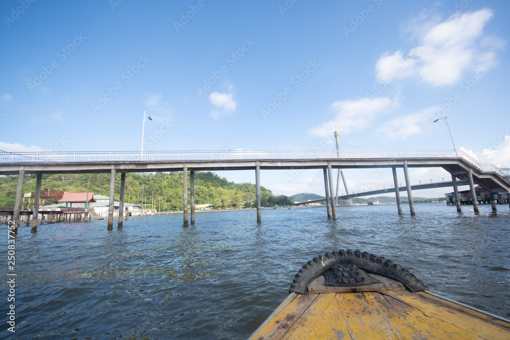 Bridge at the river village of Kampong Ayer in Bandar Seri Begawan, Brunei. Bridge at the river village of Kampong Ayer in Bandar Seri Begawan, Brunei.