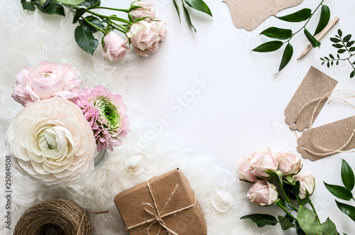 Registration of a wedding gift. Beautiful arrangement of wedding accessories and flowers on the table. Flat lay, top view mockup. Copy space.