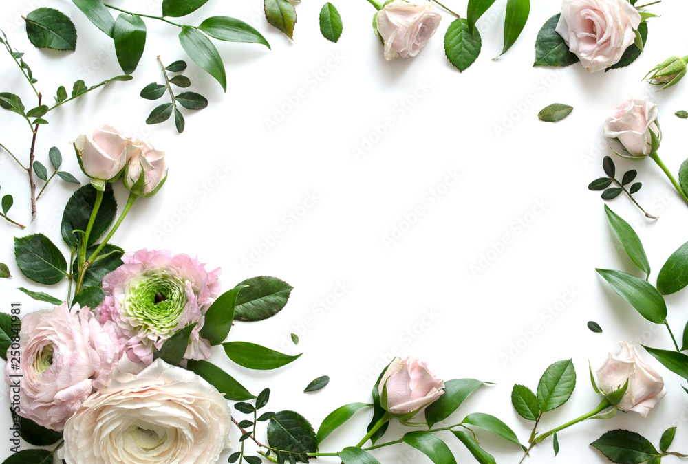 Naklejka premium Composition from pink Ranunculus and roses on a white background with space for text. Top view. Copy space. Mock-up