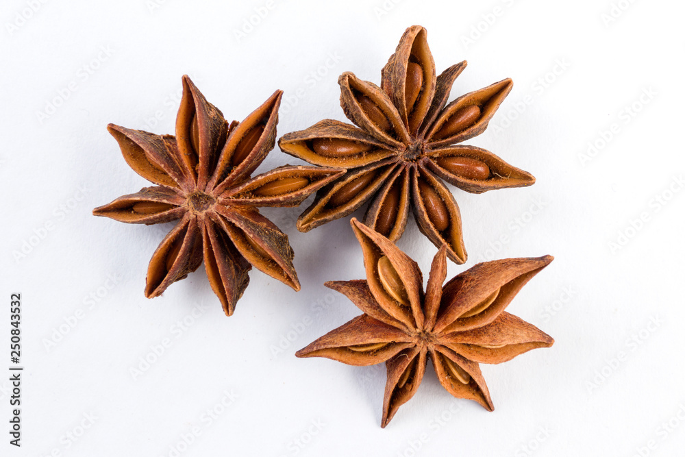 heap of anise stars isolated on white background heap of anise stars isolated on white background