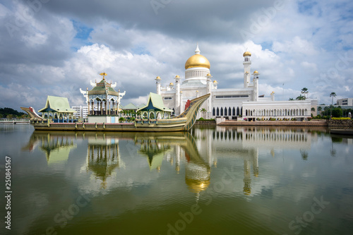 Sultan Omar Ali Saifuddien Mosque in Brunei during cloudy day. Considered as one of the most beautiful mosques in the Asia Pacific. photo