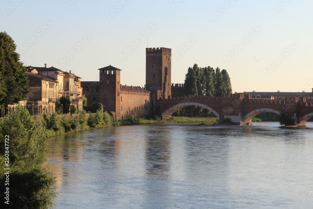 river in verona at sunset