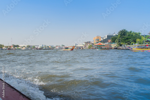 Chao Phraya riverfront view from boat along the Choa Phraya river, Bangkok, Thailand.