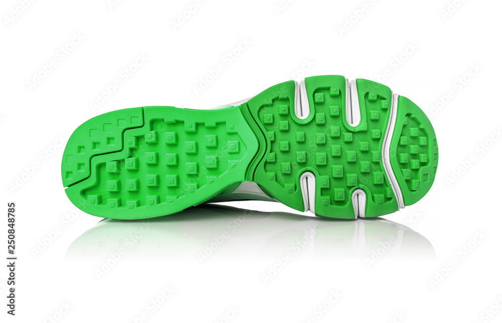 Unbranded modern sneakers isolated on a white background. Lime or green sneakers. Unbranded modern sneakers isolated on a white background. Lime or green sneakers.