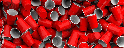 Plastic red color disposable cups pile background, texture, banner. 3d illustration photo
