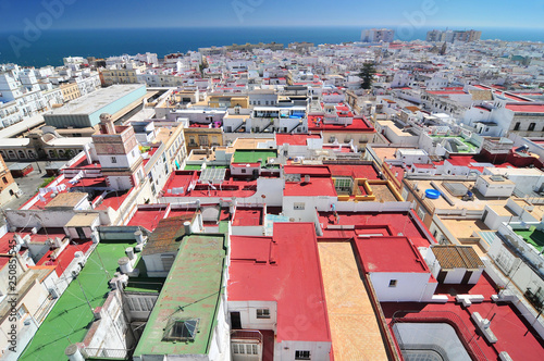 View from Torre Tavira tower to colorful roofs of Cadiz, Costa de la Luz, Andalusia, Spain. photo