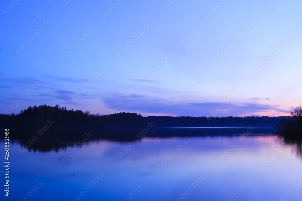 Fototapeta premium Wonderful sunset on the lake. Beautiful night