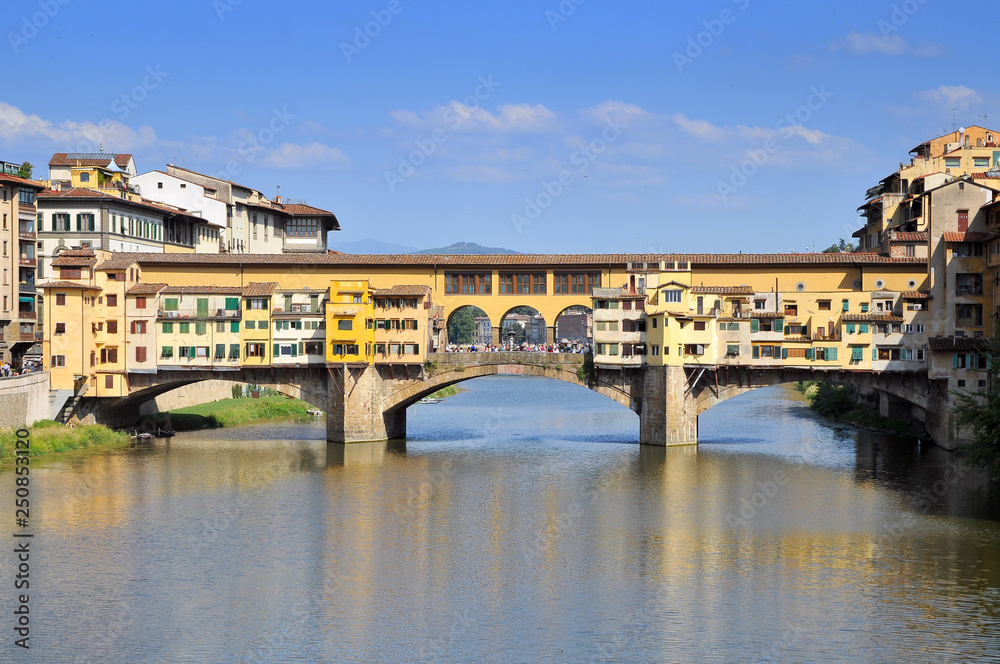 The Ponte Vecchio from the north side of the River Arno, Florence, Tuscany, Italy.