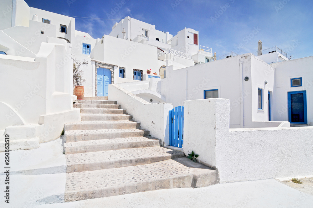 Traditional white houses Aegean architecture Ia Santorini island Greece.