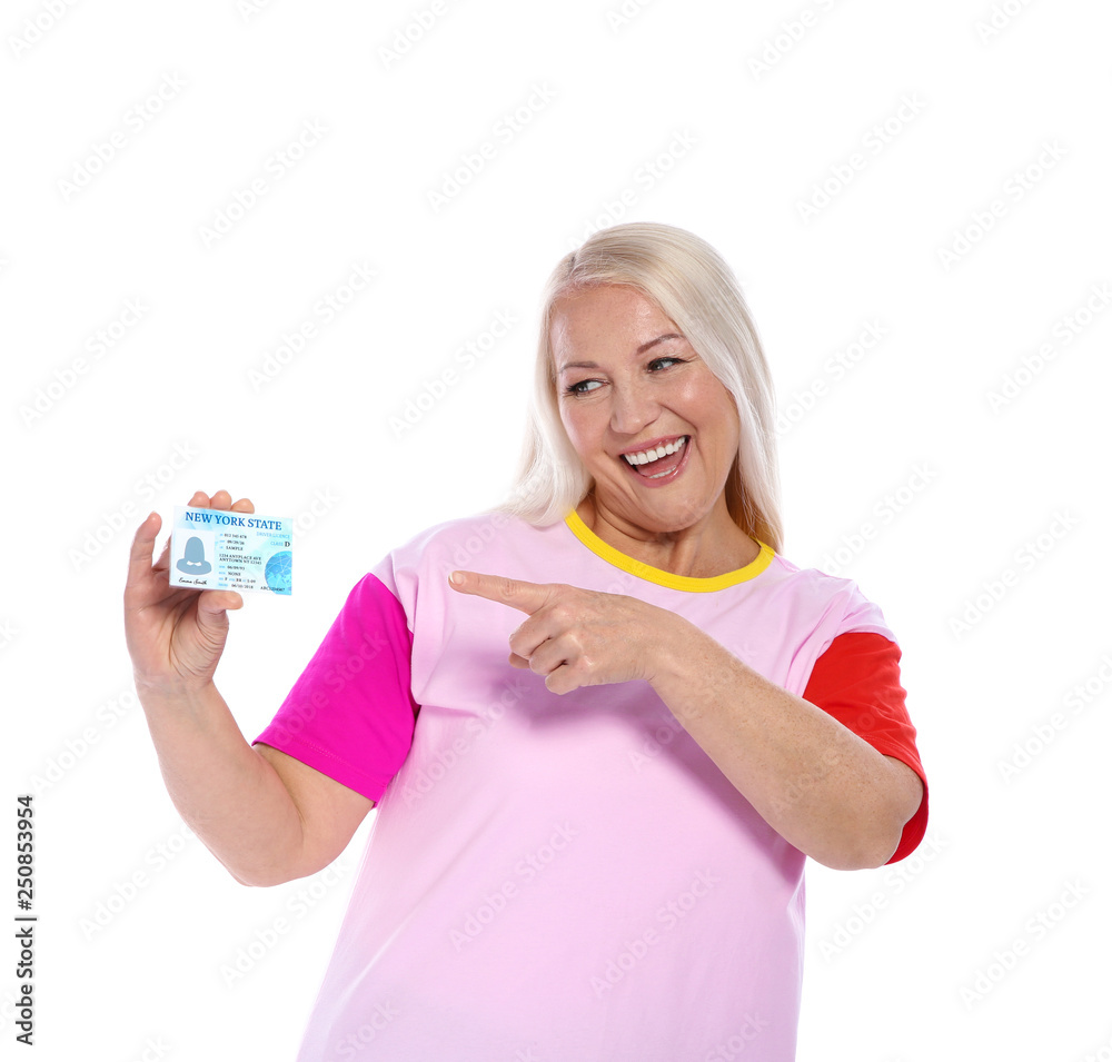Happy mature woman with driving license on white background Happy mature woman with driving license on white background