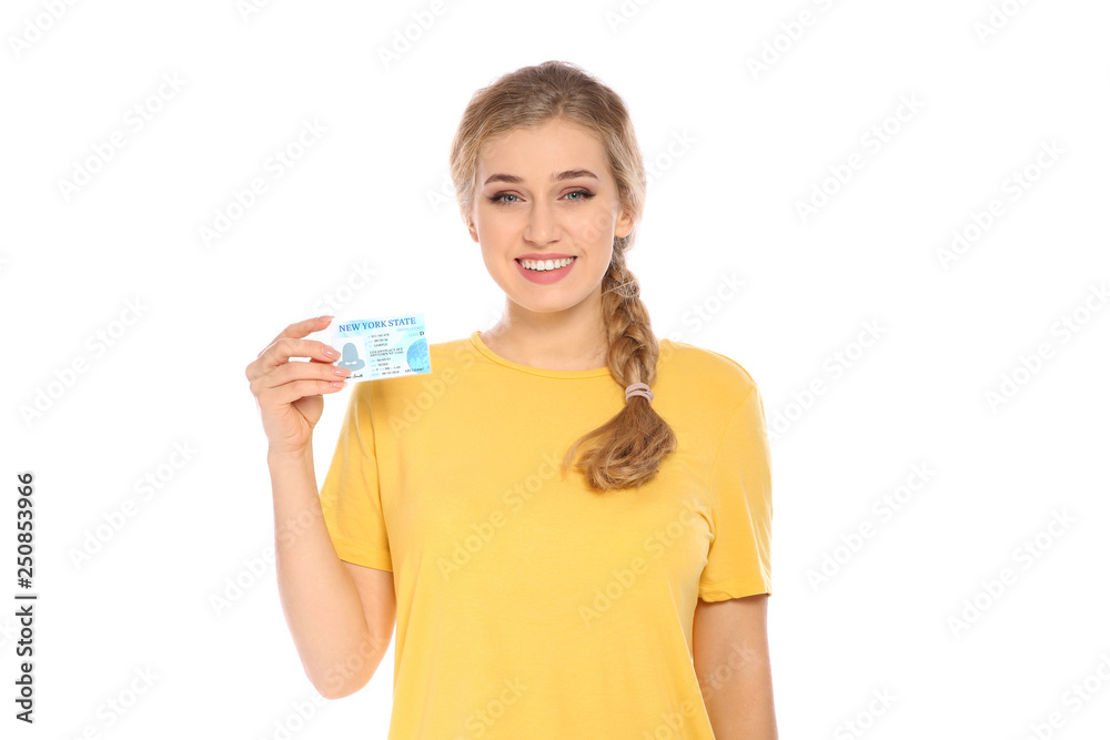 Happy young woman with driving license on white background Happy young woman with driving license on white background