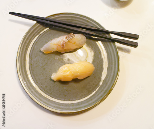 A plate of fluke fish sushi in Yasu Omakase Sushi Bar in Toronto, Canada photo