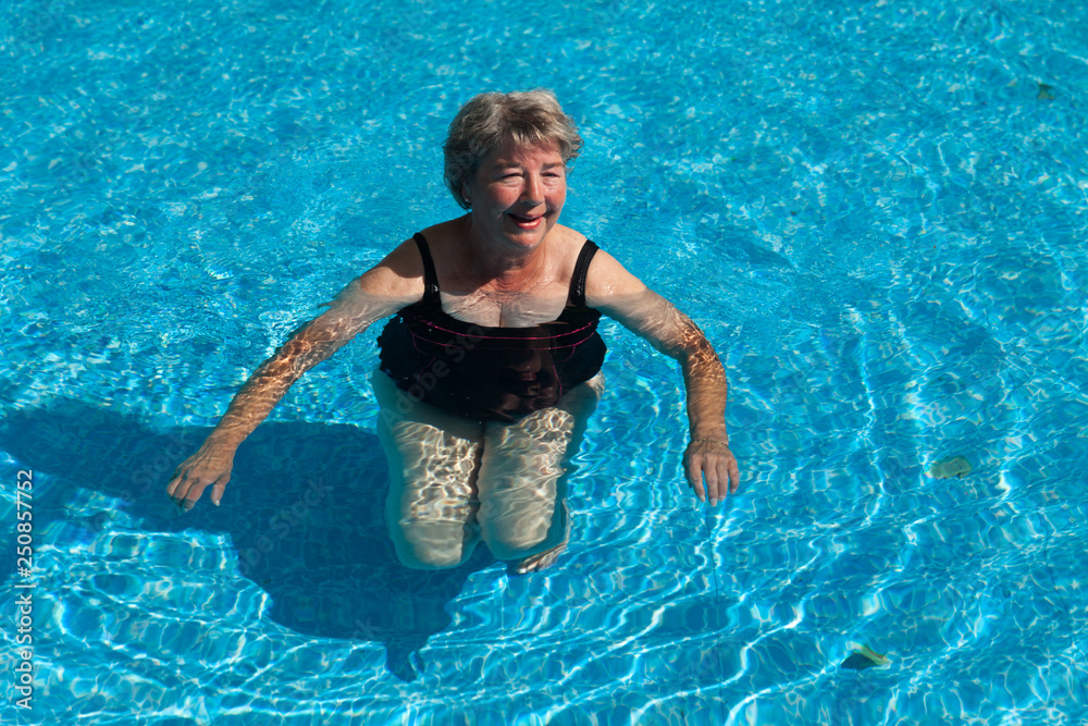 Senior Woman Swimming in a Pool	