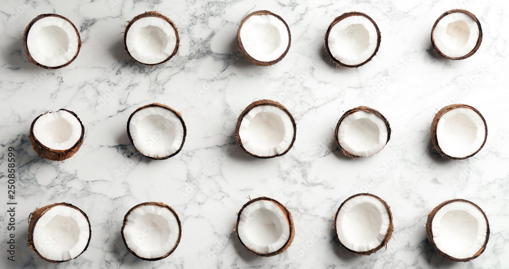 Coconut pattern on marble background, flat lay