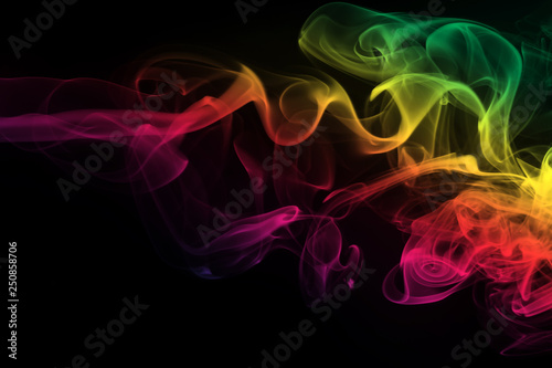 colorful smoke on black background and darkness concept, fire design