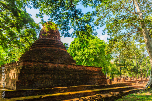 Lanka style ruins pagoda of Wat Mahathat temple in Muang Kao Historical Park  the ancient city of Phichit  Thailand. This tourist attraction is public historic site and free admission.