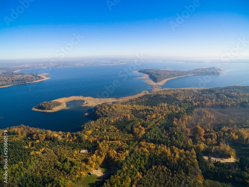 Aerial view of reinforced concrete bunkers belonged to Headquarters of German Land Forces from ww2 hidden in a forest in autumn season in Mamerki, Poland (former Mauerwald, East Prussia) photo