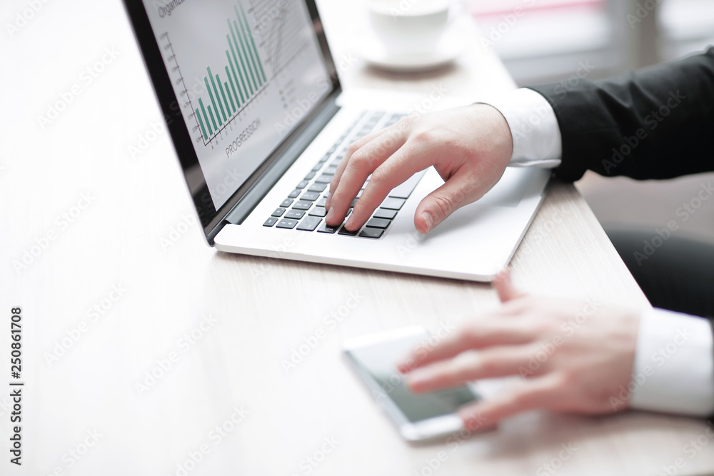 closeup.modern businessman working in the office. photo with copy space. closeup.modern businessman working in the office. photo with copy space.