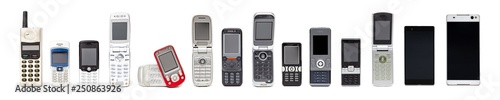 Old mobile phones from past to present on white background.