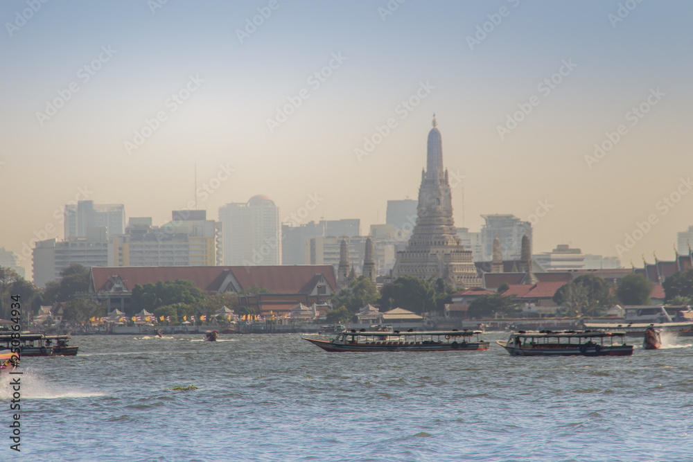 Waterway traffic in Chao Phraya River. The Chao Phraya Express Boat, a transportation service in Thailand operating on the Chao Phraya River, Bangkok, Thailand.