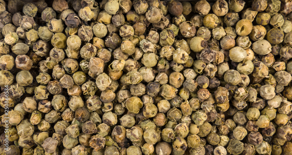 green pepper peppercorns background. Natural seasoning texture. green pepper peppercorns background. Natural seasoning texture.