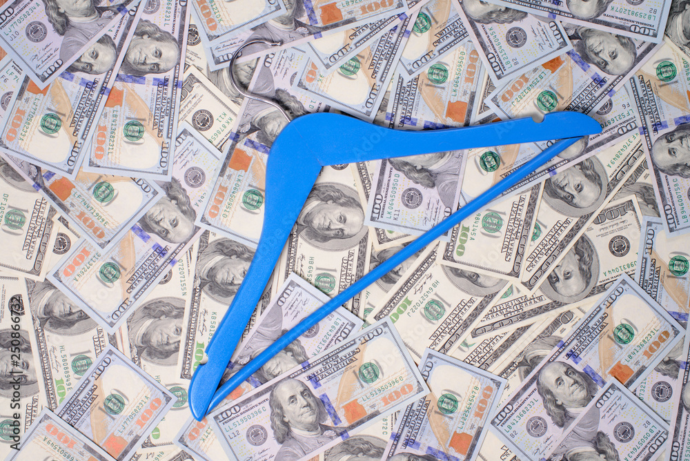 Obraz premium hanger on a dollars background