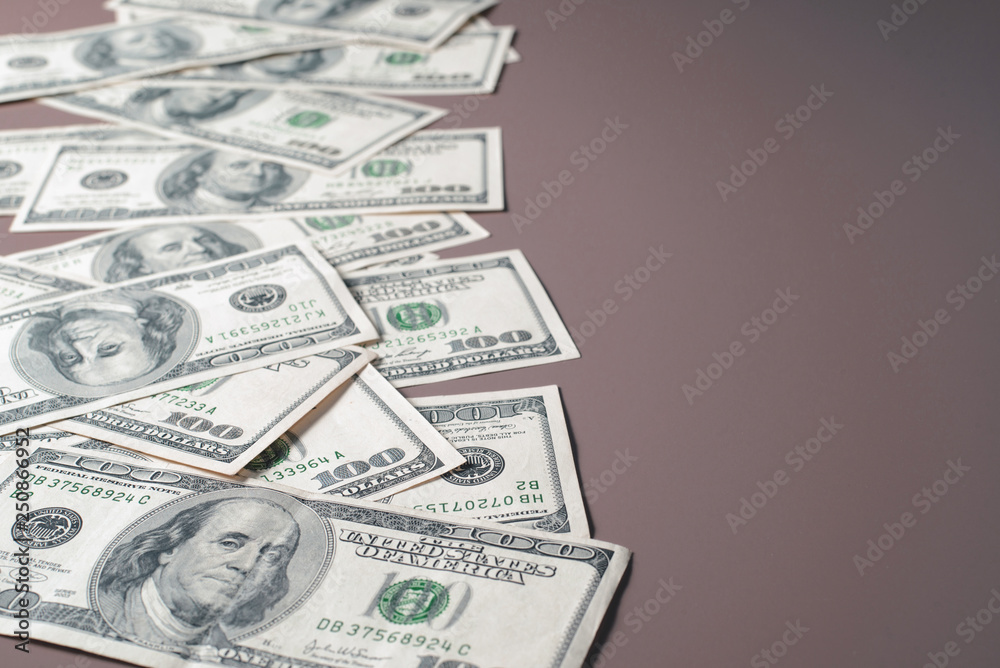 Dollars frame on brown background. top view. copy space. Dollars frame on brown background. top view. copy space.