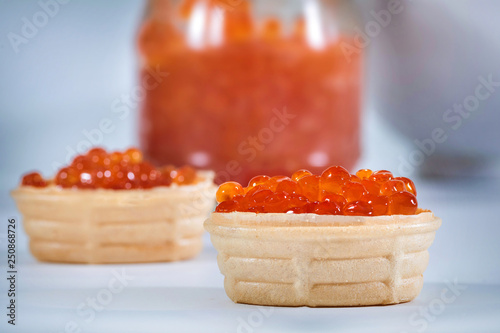 Tartlets with red caviar. Cold appetizers. Seafood