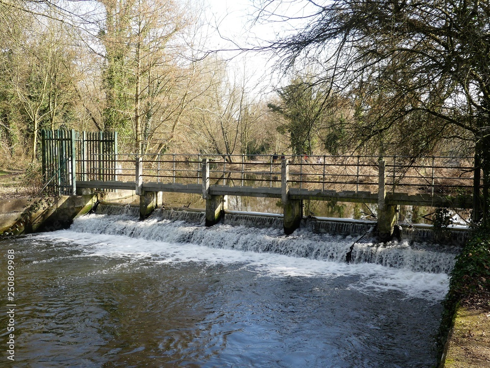 Weir on the River Colne at Rickmansworth Aquadrome, Hertfordshire, UK Weir on the River Colne at Rickmansworth Aquadrome, Hertfordshire, UK